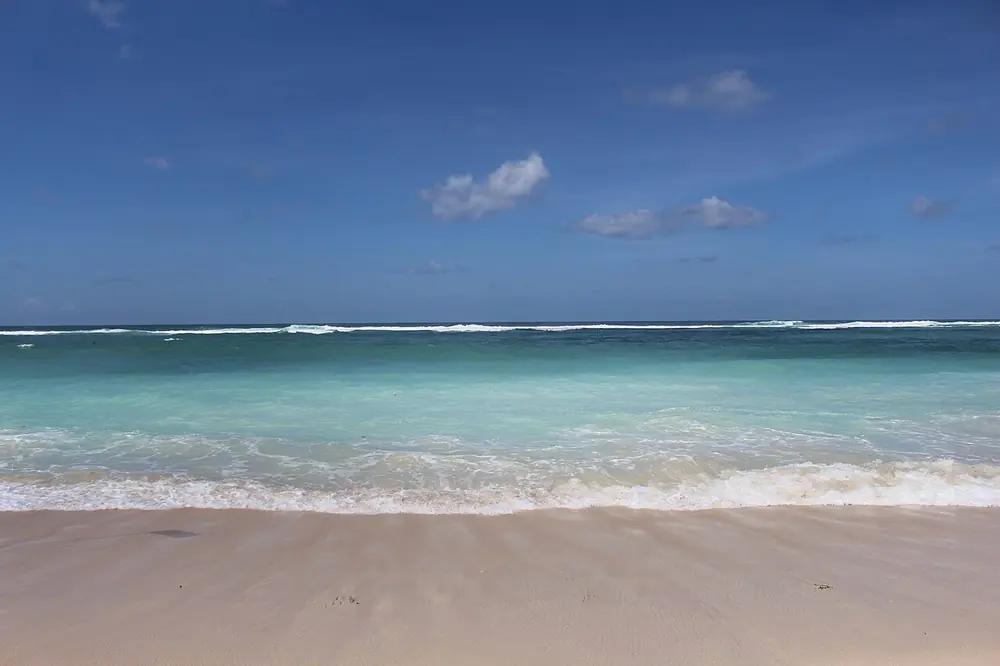 A road carved into the limestone cliff — Pandawa Beach, While you're in Geger