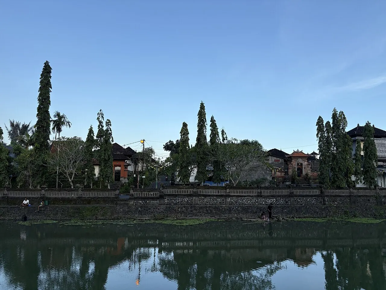 Taman Ayun's tiered meru reflected in the moat, 5 minutes from central Mengwi