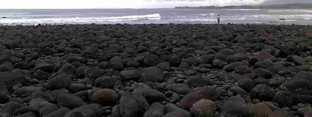 Medewi's long left from the headland, 10 minutes by scooter