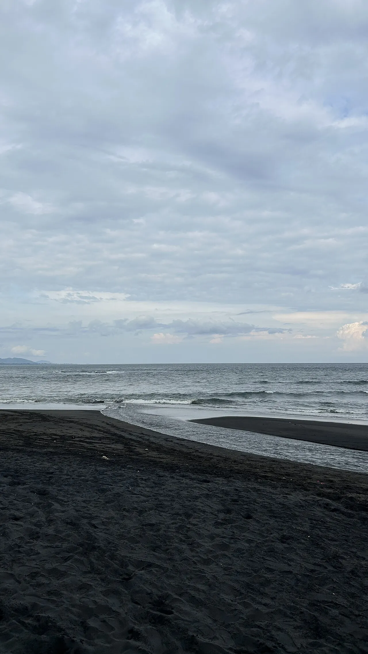 Saba Beach, the black-sand horse-riding beach of east Bali