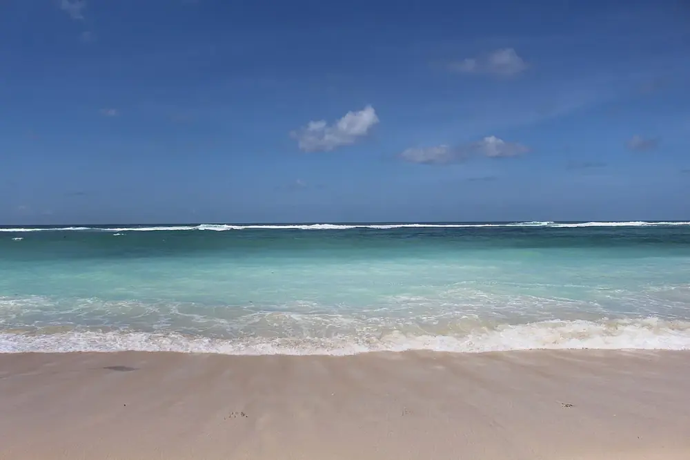 A road carved into the limestone cliff — Pandawa Beach, While you're in Ungasan